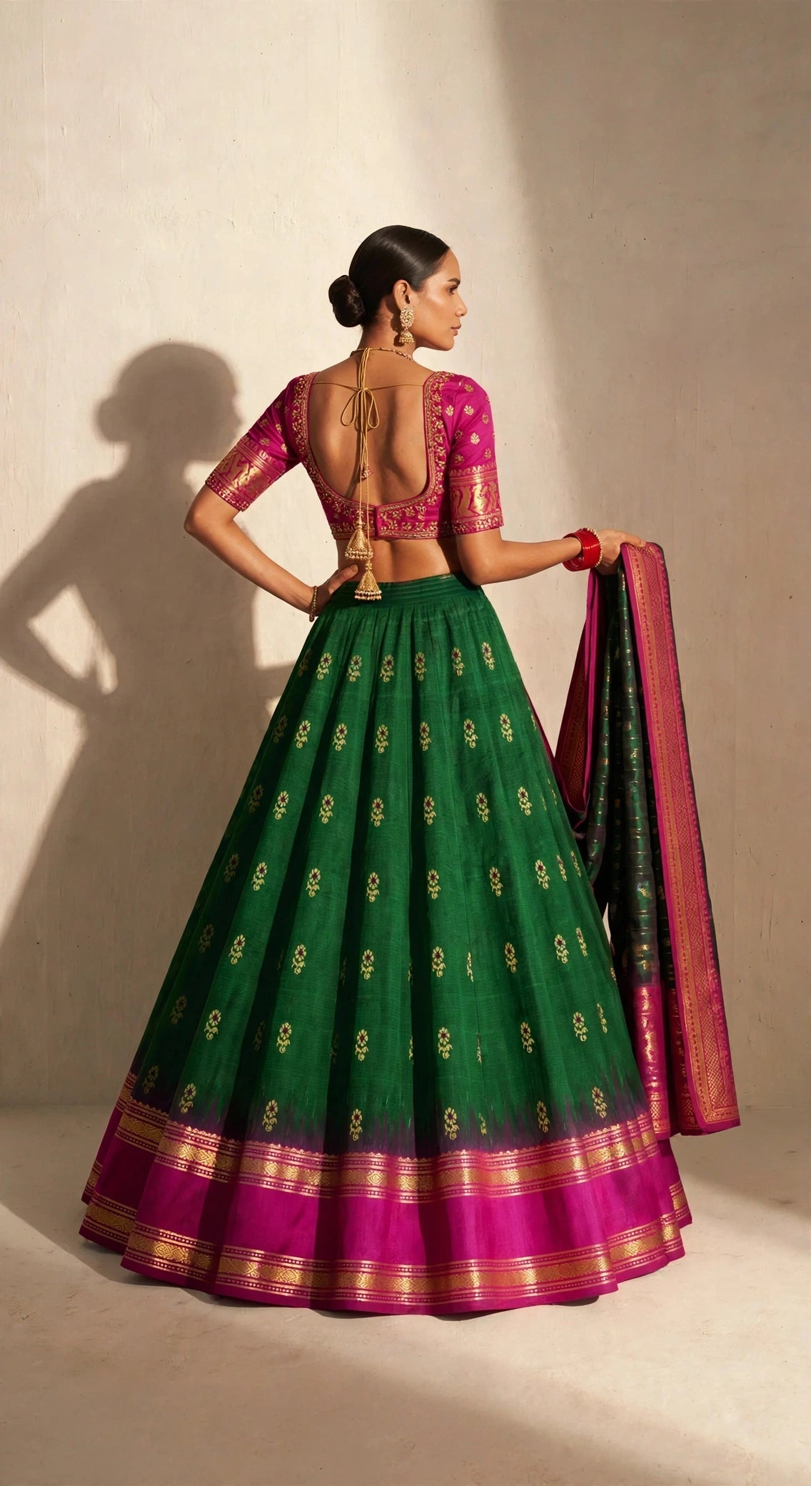 Emerald green Molkalmuru lehenga set with magenta silk blouse - front view